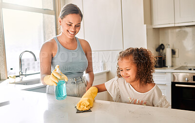 Buy stock photo Woman, kid and help in kitchen for cleaning, learning and smile for responsibility development. Mother, girl and detergent in home for hygiene, bacteria prevention or teaching chores for child growth