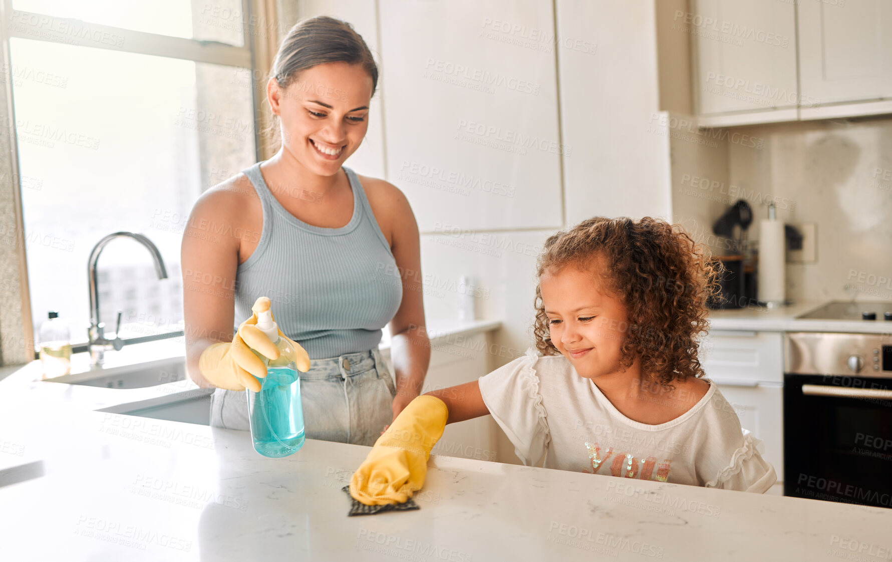 Buy stock photo Woman, kid and help in kitchen for cleaning, learning and smile for responsibility development. Mother, girl and detergent in home for hygiene, bacteria prevention or teaching chores for child growth