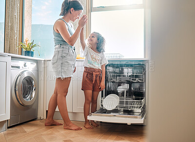 Buy stock photo Mother, kid or dishwasher in kitchen with high five, learning or smile for responsibility development. Woman, girl or pack appliance in home for hygiene, good job or teaching chores for child growth