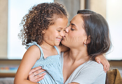 Buy stock photo Embrace, kiss and mom on sofa with child for morning bonding, gratitude and support in fun family home. Love, mother and daughter on couch with happy hug, care and connection in living room together.