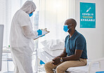 Patient talking to a doctor during a checkup. Specialist writing patients information on clipboard. Doctor reading patient's covid report. Patient in a consult with a gp in a clinic