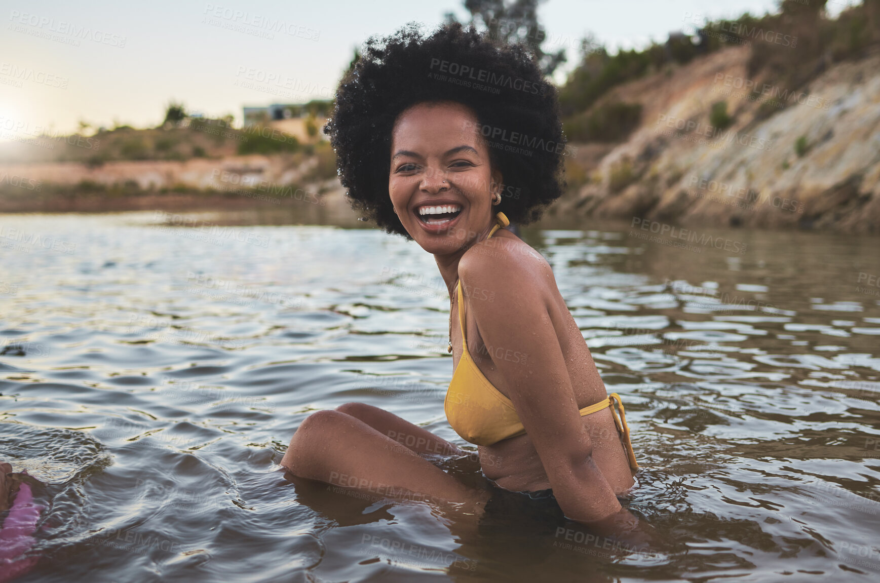 Buy stock photo Portrait, lake and black woman with smile, vacation and travel with nature, weekend break and calm. African person, outdoor and girl with water, happiness and swimming with joy, summer holiday or fun