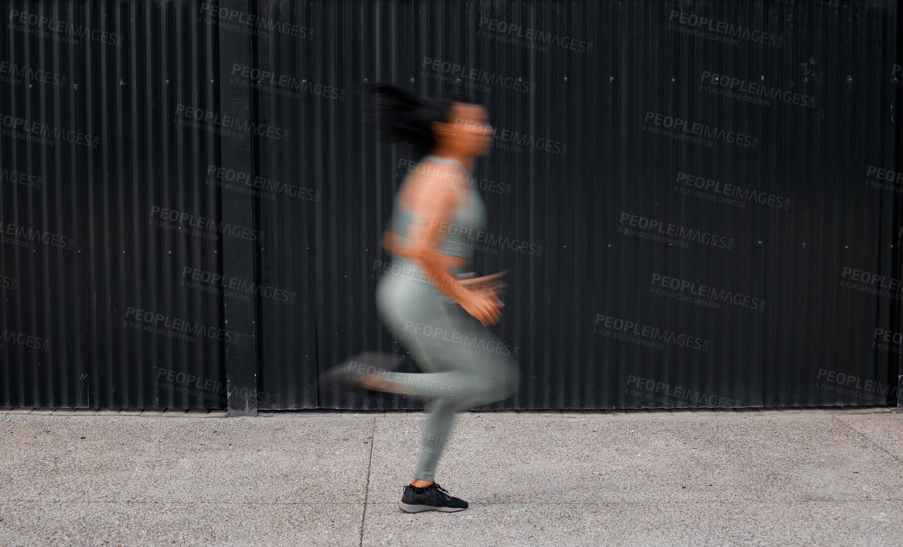 Buy stock photo Speed, running and woman with fitness, training and wellness with challenge in city. New York, blur or athlete with practice, exercise or outdoor with workout routine, cardio or sports with endurance