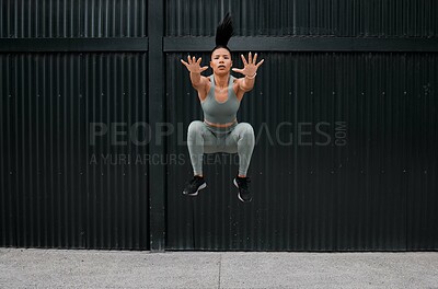 Buy stock photo Athlete, girl and jumping for exercise outdoor with fitness, sports training and energy of health workout. Active, woman and leap with cardio performance, endurance progress and competition practice