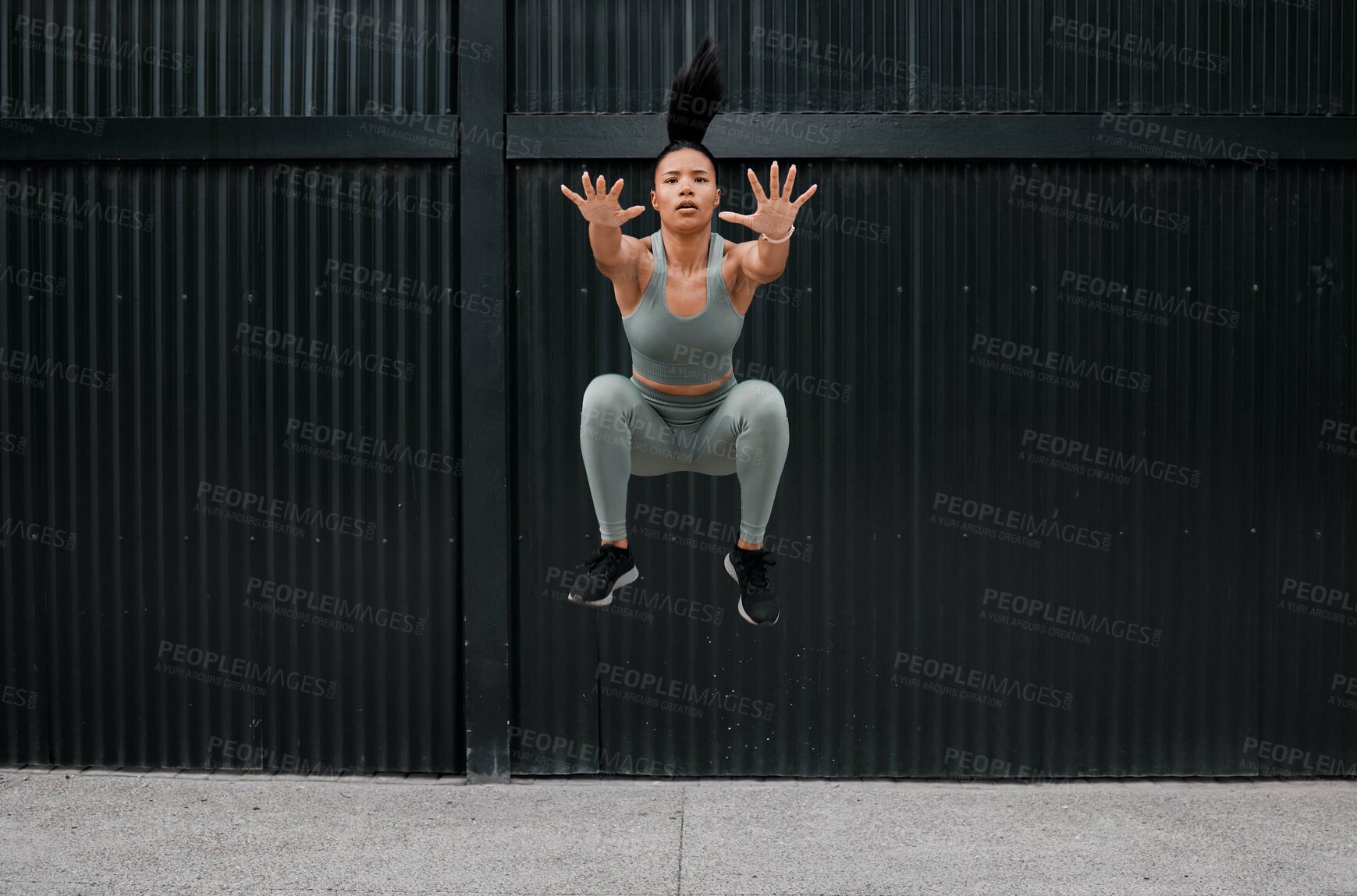 Buy stock photo Athlete, girl and jumping for exercise outdoor with fitness, sports training and energy of health workout. Active, woman and leap with cardio performance, endurance progress and competition practice