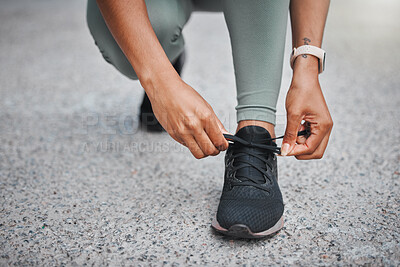 Buy stock photo Fitness, woman and hands tying shoes outdoor to prepare for training, exercise and start workout for health on road. Sneakers, tie laces and runner ready for wellness, sports and closeup on street