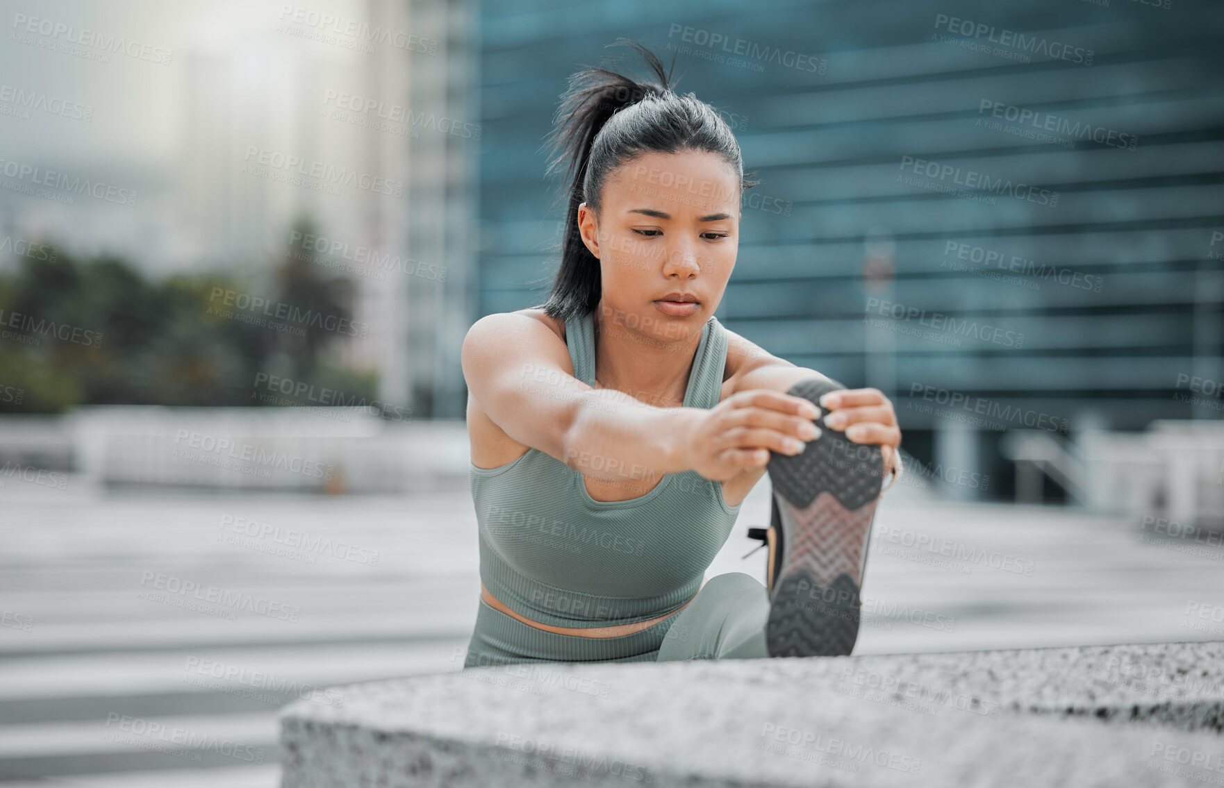 Buy stock photo Fitness, woman and stretching legs outdoor to prepare for exercise, workout and training. Flexibility, urban runner and warm up in city for body health, wellness and ready to start sports practice