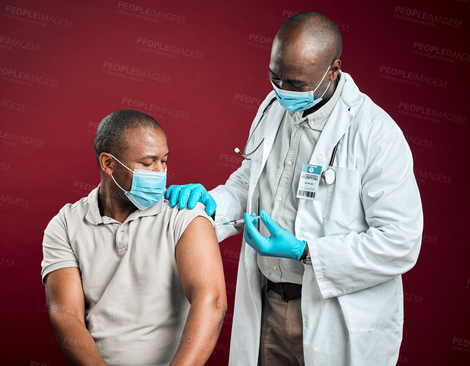 Buy stock photo Covid vaccine, needle and African doctor with black man, health or wellness for pandemic safety. Patient, protection and drug for corona, risk control or disease treatment on red background in studio