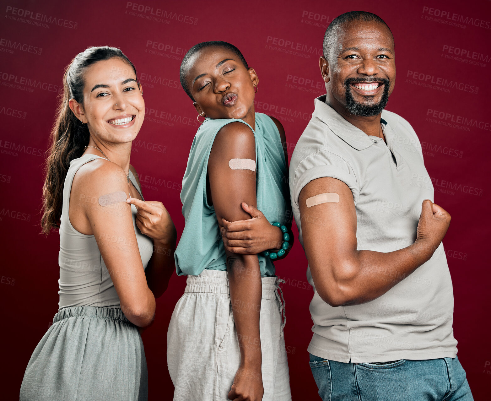 Buy stock photo People, friends and vaccine in studio background with plaster for safety and protection. Diversity, happy and satisfied for healthcare on portrait with bandage for virus immunity and prevention