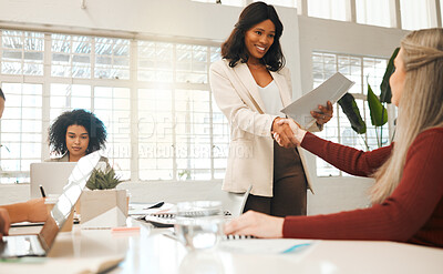 Buy stock photo Business women, meeting and handshake with partnership for recruiting, agreement or deal at office. Female people, employees or colleagues shaking hands for job hiring or introduction at workplace