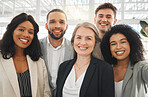 Portrait of a group of five cheerful diverse and positive businesspeople taking a selfie together at work. Young happy caucasian businessman taking a photo with his joyful colleagues