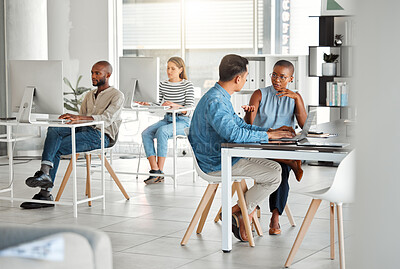 Buy stock photo Office, man and woman at laptop for discussion, ideas and collaboration together in coworking space. Proposal, development and business people at digital agency for meeting, teamwork and planning