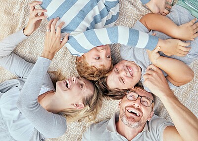 Buy stock photo Above, family or play on blanket for picnic, summer fun or relationship development in Australia. Parents, kids or laugh for tickle in sunshine for relax, vacation trip or trust with positive energy