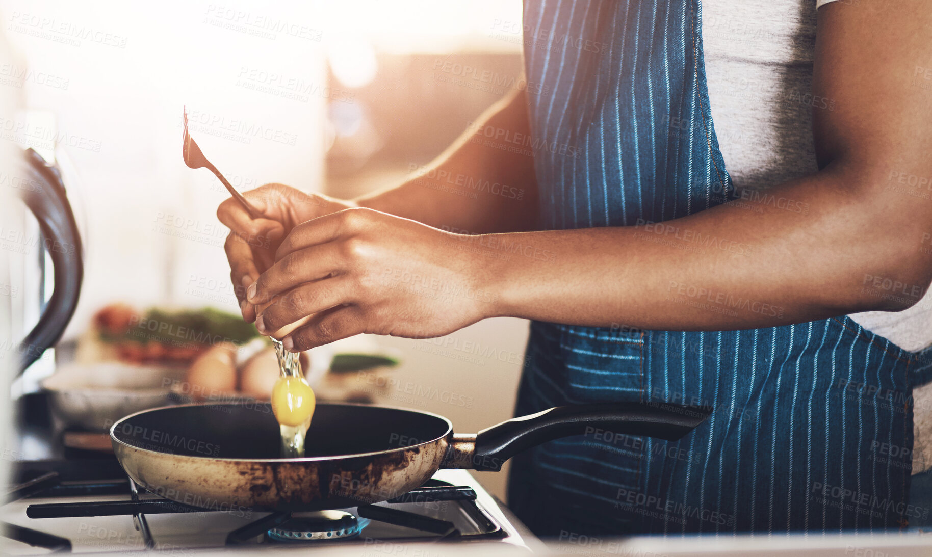 Buy stock photo Cooking, frying pan and person with eggs in kitchen for breakfast omelette, meal prep and eating in morning. Home, stove and hands with ingredients for cuisine, nutrition and wellness in apron