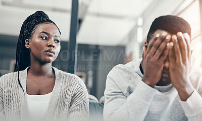 Buy stock photo Home, black couple and argument with stress on sofa in living room, upset or hurt. People, apartment and relationship with fighting, break up and separation with guilt, conflict and frustrated