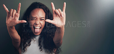 Buy stock photo Woman, portrait and rock gesture with hands for grunge sign, rockstar or devil horns in studio on gray background. Crazy, aesthetic and female model for emoji, punk icon or rebel symbol with mockup