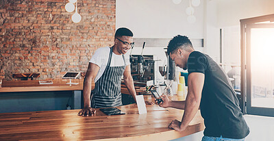 Buy stock photo Barista, men and client in cafe, machine and pos with transactions, store and buying. Employee, waiter and customer with payment, service and restaurant with purchase, ecommerce and business owner