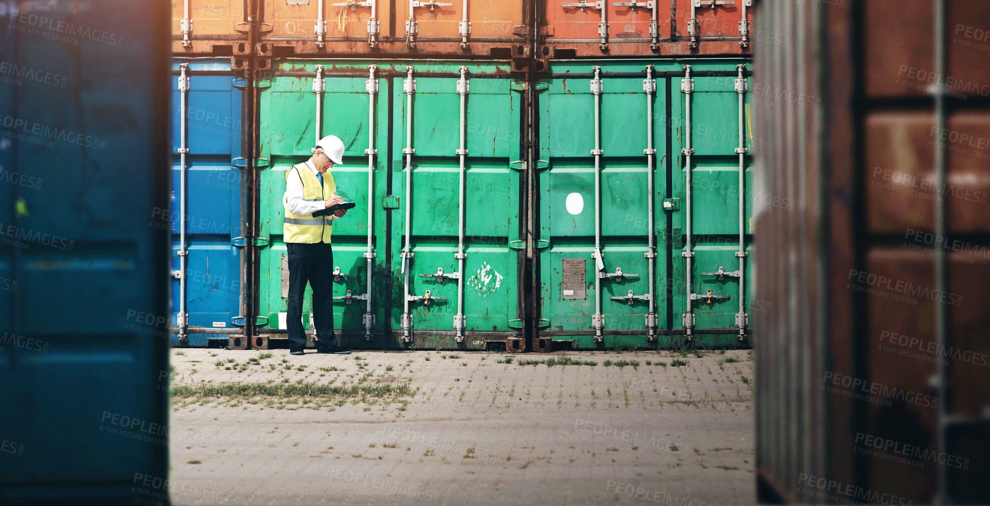 Buy stock photo Mature man, tablet and container for shipping at harbor, inspection or career in supply chain management. Person, touchscreen and logistics industry with cargo, distribution and storage in Portugal