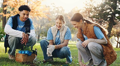 Buy stock photo Nature, happy and people with plant in park for growth, sustainability and eco friendly charity outreach. Gardening, earth day and volunteer group with sprout for environment, ecosystem and ecology