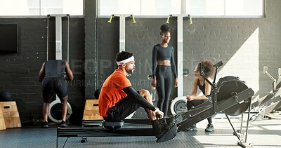 Buy stock photo Man, rowing machine and gym for fitness, exercise or training for muscle development in class. Person, challenge and equipment for routine, bench or progress for body transformation at wellness club