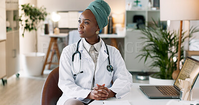 Buy stock photo Black woman, doctor and thinking in hospital for healthcare, knowledge or confident at laptop. Empowerment, cardiologist and tech in practice for telehealth, online consultation or expert in medicare