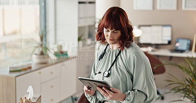 Buy stock photo Office, woman and doctor with tablet for healthcare, digital and research for medical information. Clinic, female person and therapist with tech for telehealth, schedule appointment or online booking