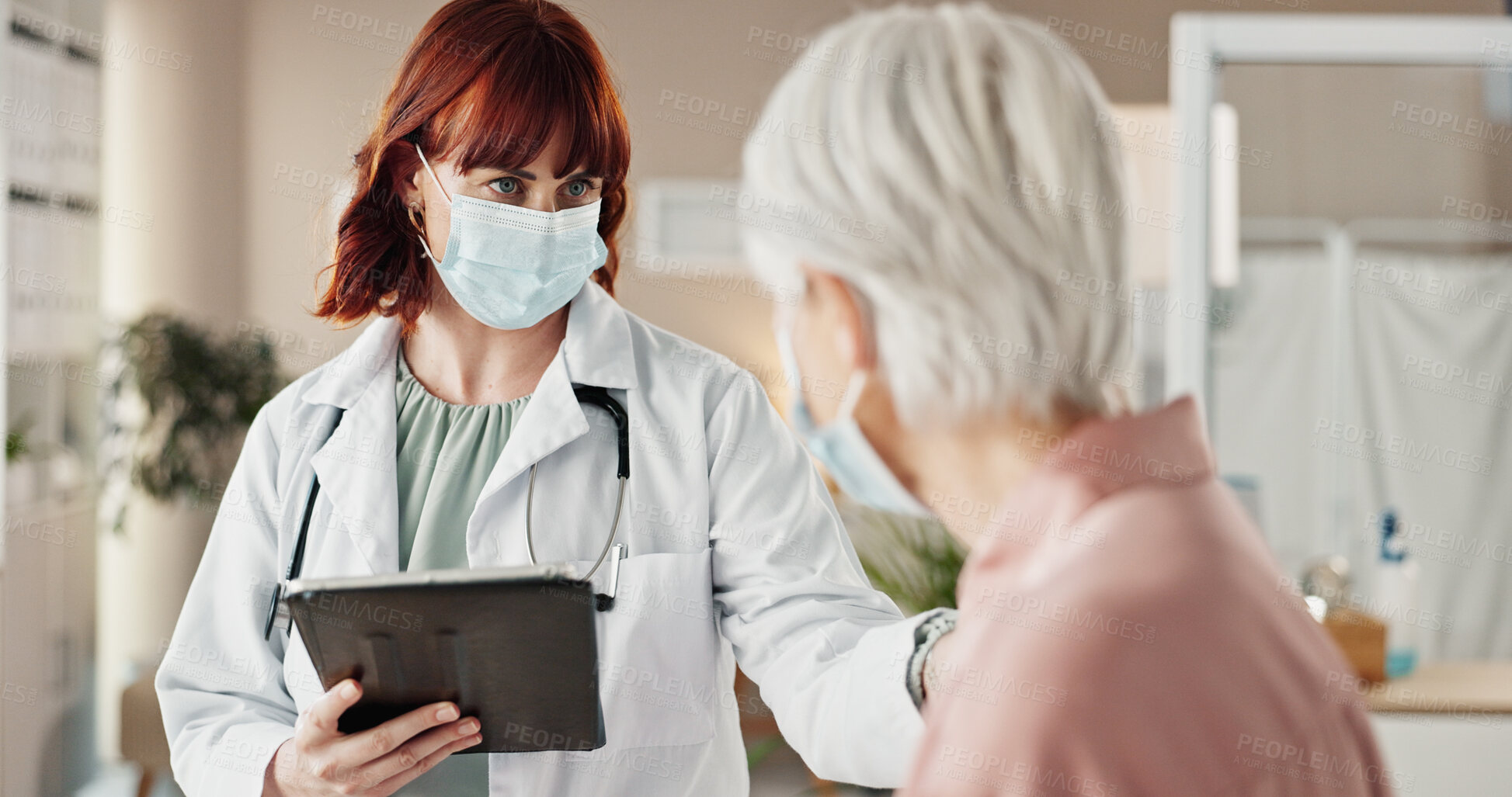 Buy stock photo Mask, patient and doctor with consultation, tablet and appointment with treatment. Healthcare, pensioner and medical with professional, face cover and technology with safety, connection and advice