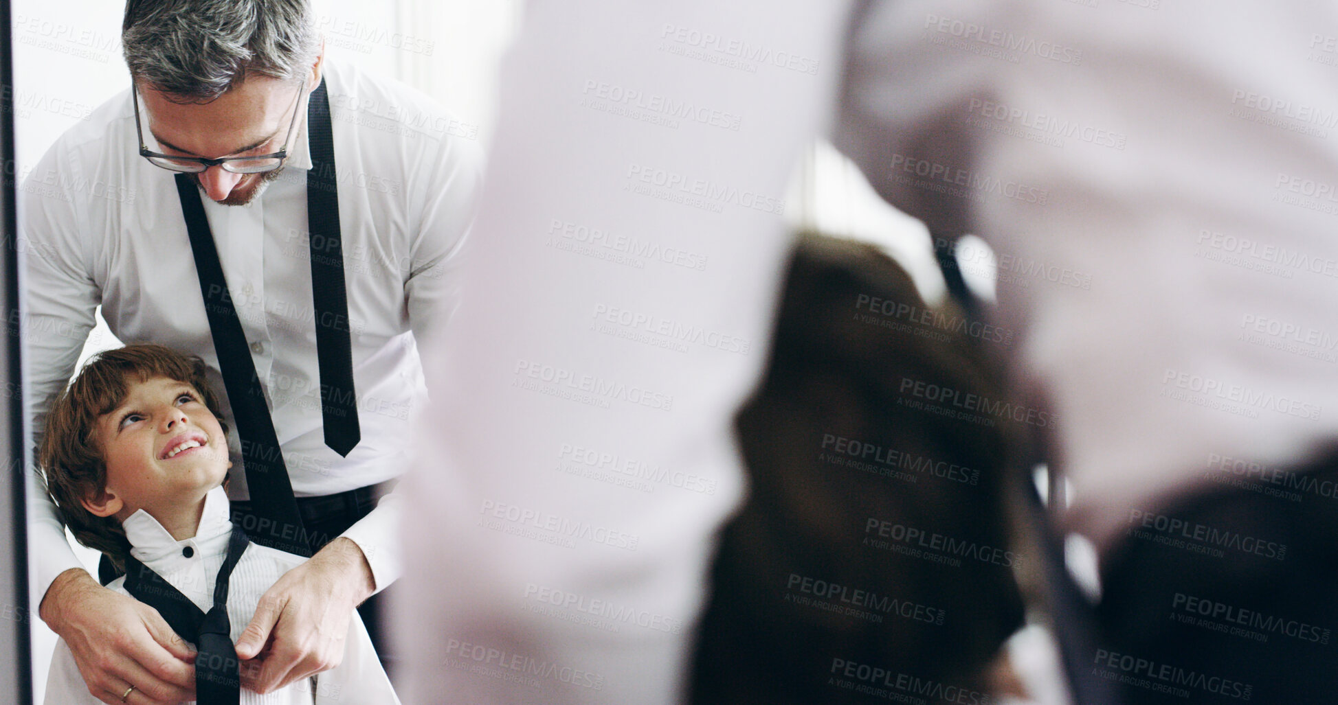 Buy stock photo Father, happy child and help with necktie by mirror for event preparation, learning fashion or ready in family home. Dad, kid and boy in formal tie, wear clothes or dressing with reflection of parent