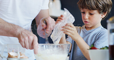 Buy stock photo Child, baking and kitchen with father help, food and love in family home with cooking. Learning, young boy and bowl for cake with bonding, smile and development with flour ingredients and dessert