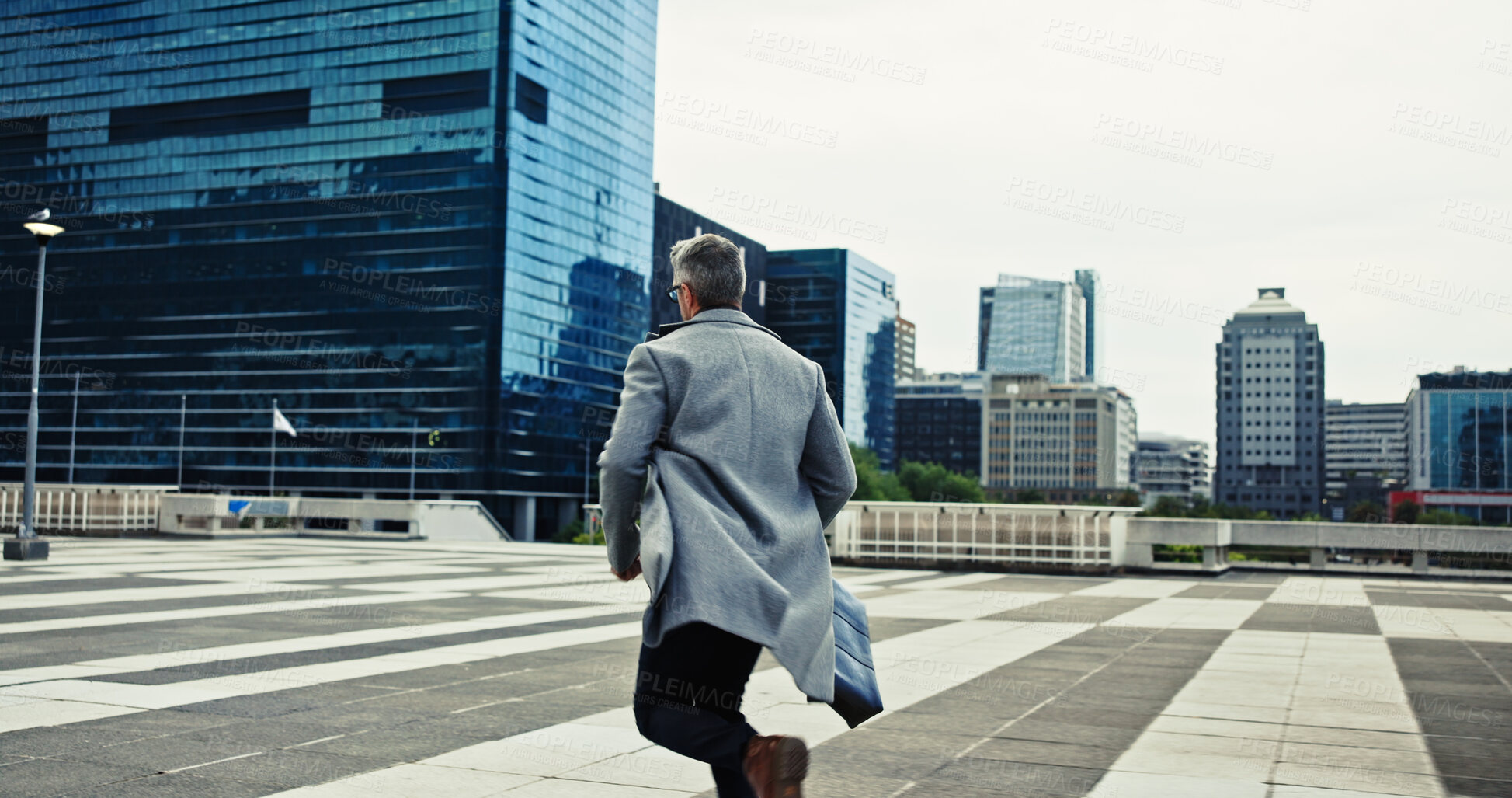 Buy stock photo Back, businessman and running late in city for meeting as real estate agent for morning commute. Male person, outdoor and realtor for transport, travel and career as property investment in Australia
