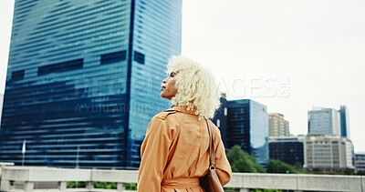Buy stock photo Back view, sightseeing or woman in city with urban fashion or trendy coat outside in New York. Ideas, skyscraper or creative female designer walking in street for holiday travel, commute or thinking