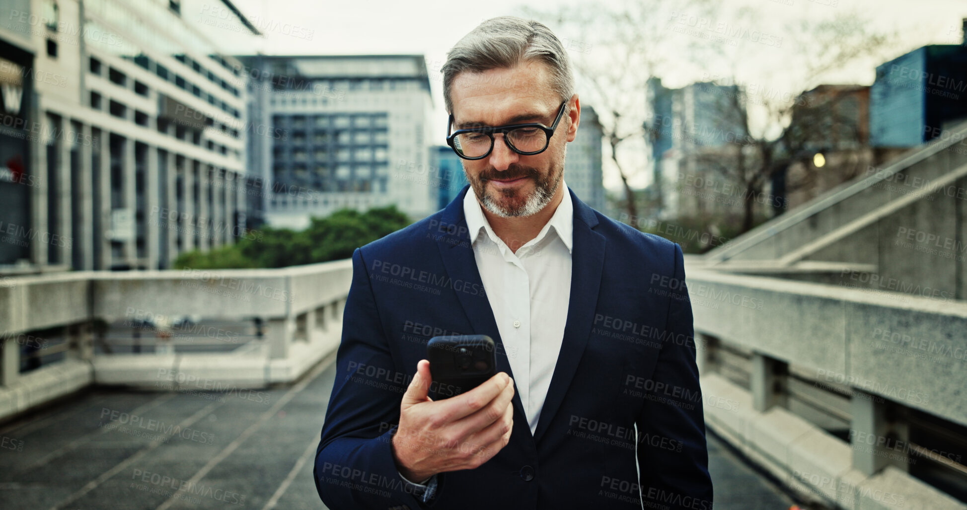 Buy stock photo City, commute and phone with mature businessman outdoor for communication, networking or travel. App, corporate and directions with professional employee outdoor in urban town to search for location 