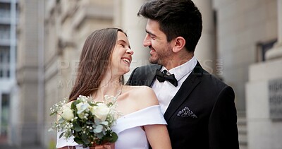 Buy stock photo Wedding, laugh and couple in city for love at marriage ceremony, celebration and event. Romance, affection and man and woman embrace for commitment, partnership and promise for court certificate