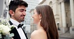Wedding, happy and couple in city for love at marriage ceremony, celebration and event. Romance, affection and man and woman embrace for commitment, partnership and promise for court certificate