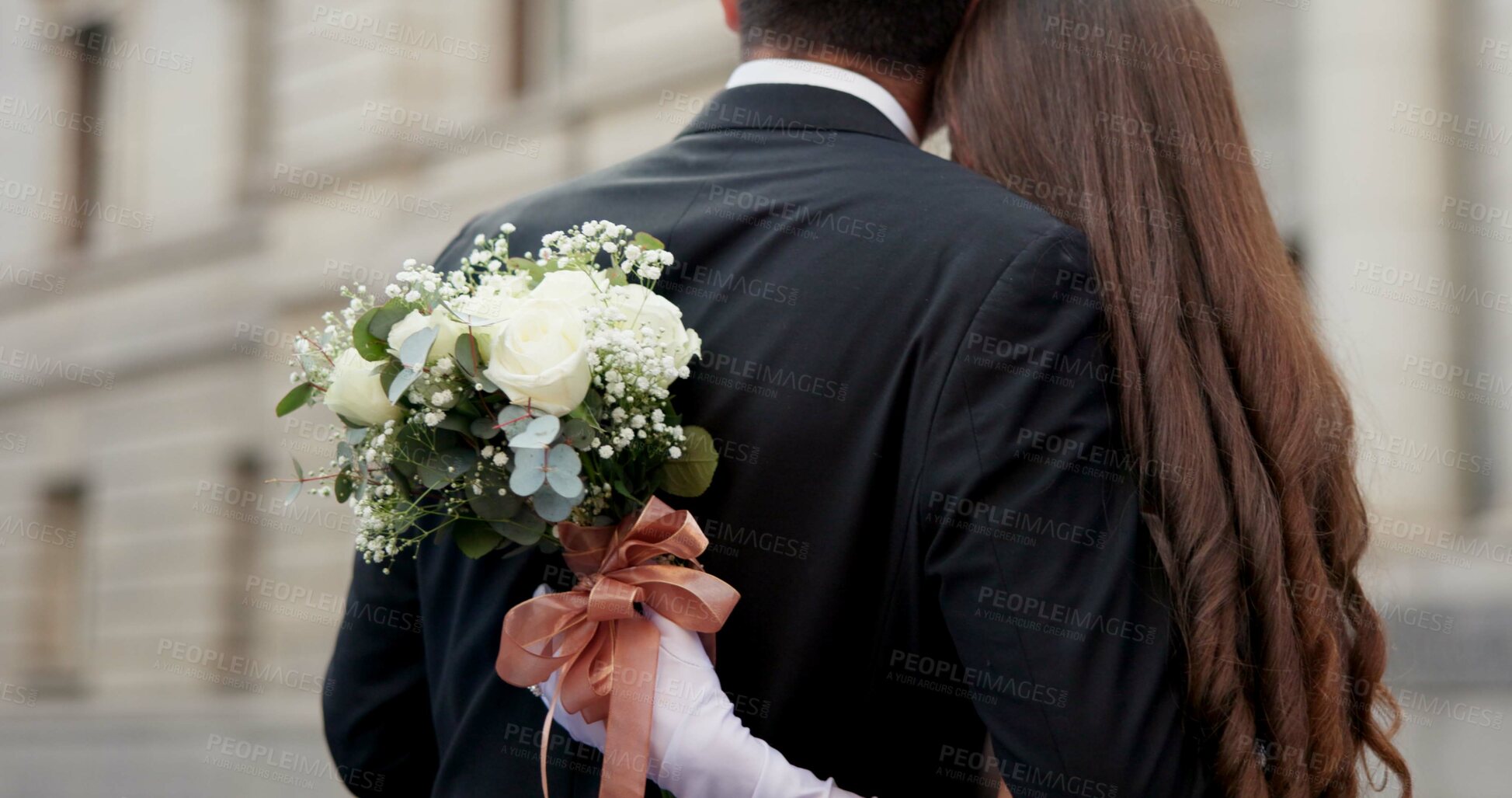 Buy stock photo City, flowers and couple at wedding with hug, love and bride with groom in street together from back. Urban romance, man and woman at court marriage with commitment, bouquet and outdoor embrace.