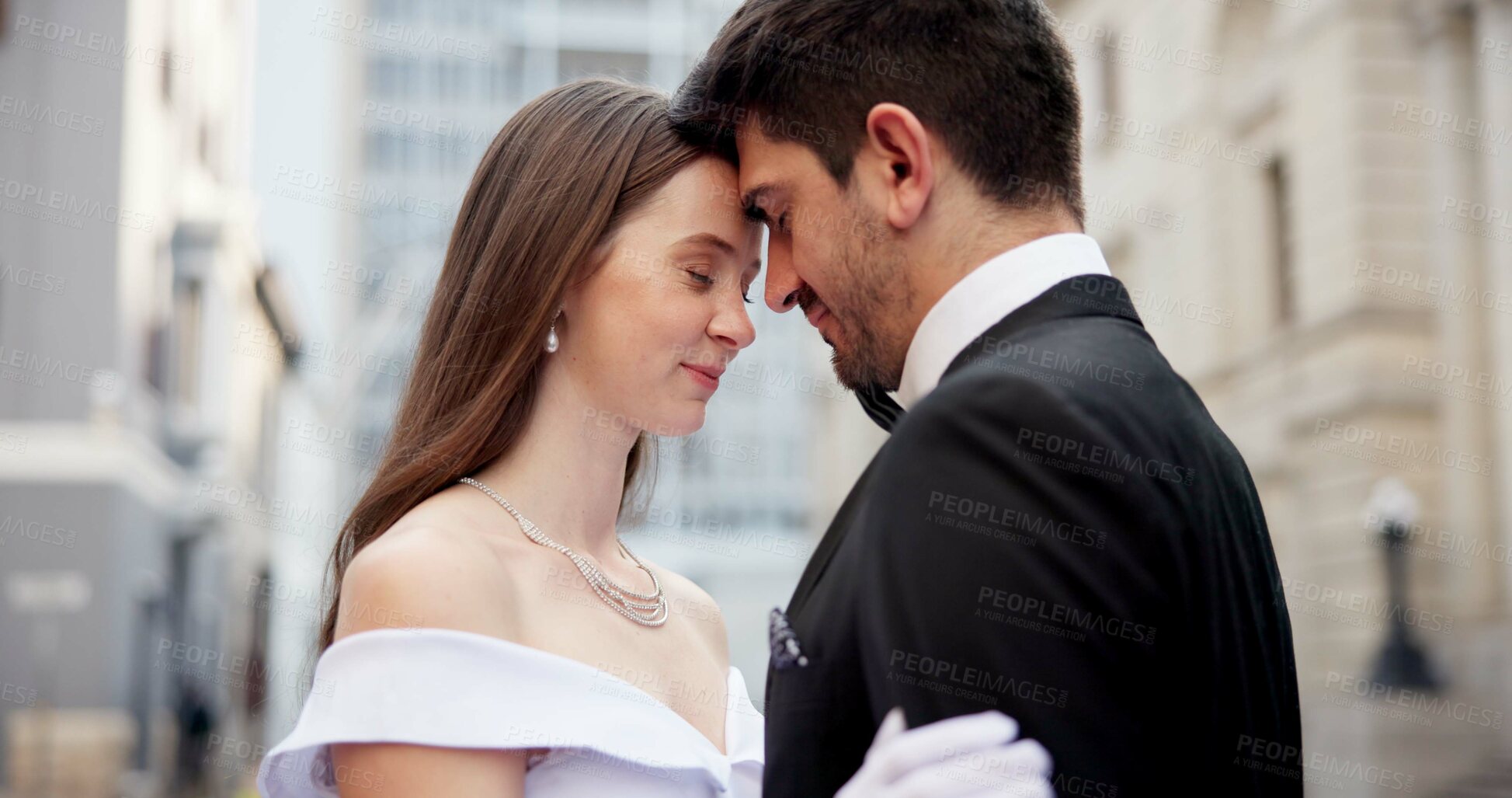 Buy stock photo City, building and couple at wedding with embrace, love and bride with groom in street together. Urban romance, man and woman at court marriage event with commitment, peace and outdoor celebration.
