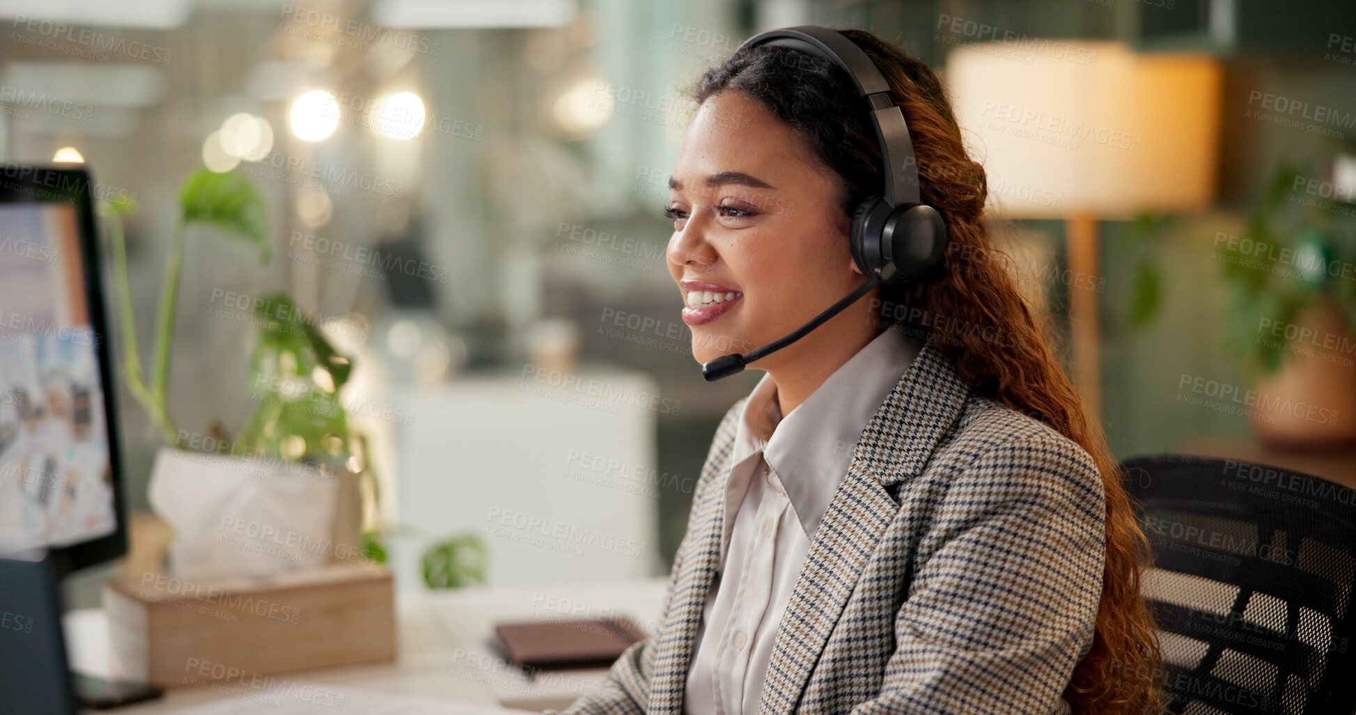 Buy stock photo Woman, call center and happy at night, computer and headphones with customer support, job and microphone. Person, agent and consultant with voip, thinking and overtime with telemarketing at workplace