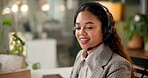 Woman, call center and happy at night, headphones and mic with customer support, crm and advice in office. Person, agent and consultant with voip, thinking or overtime with telemarketing at workplace