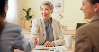 Buy stock photo Business women, handshake and work meeting with management, deal and agreement in office. Happy, success and mature professional with thank you, hiring or welcome with b2b partnership with smile