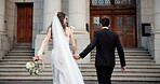 City, running and back of couple for wedding at town hall for marriage certificate, ceremony and legal matrimony. Holding hands, love and man and woman at court for commitment, promise or partnership