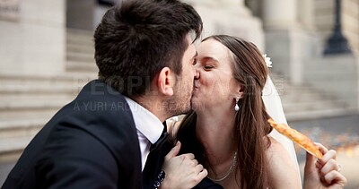 Buy stock photo Couple, kiss and pizza on wedding outdoor for celebration, unity success and marriage commitment. Smile, people and food with promise for partnership, love relationship and romance ceremony at court