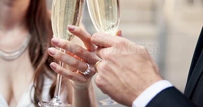 Buy stock photo Couple, hands and toast with champagne on wedding for celebration, unity success and marriage commitment. People, promise and alcohol cheers for partnership, relationship loyalty and romance ceremony