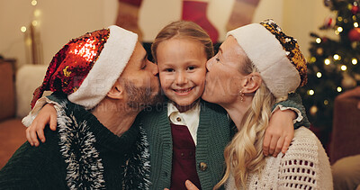 Buy stock photo Portrait, parents and child with kiss on Christmas for festive celebration, love and bonding together. Family, mother and father with daughter in living room of home for holiday, season and gratitude