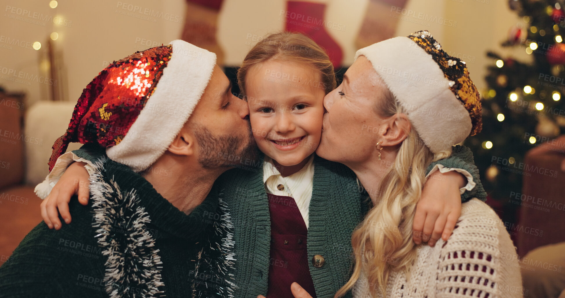 Buy stock photo Portrait, parents and child with kiss on Christmas for festive celebration, love and bonding together. Family, mother and father with daughter in living room of home for holiday, season and gratitude