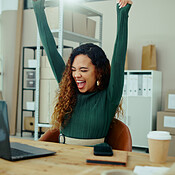 Woman, laptop and celebration in warehouse with boxes, success and ...