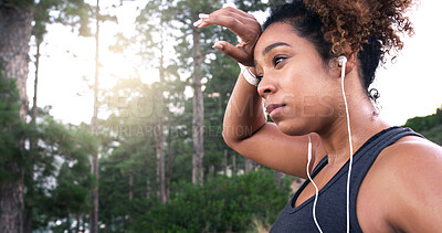 Buy stock photo Girl, runner and earphones with sweat, outdoor or perspective with music, fatigue or fitness training in woods. Woman, reflection and streaming for exercise, workout and tired in forest in Costa Rica
