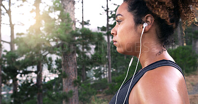 Buy stock photo Woman, runner and earphones with sweat, nature or music for perspective, fatigue or fitness training in summer. Girl, reflection and streaming in forest for exercise, workout and tired in Costa Rica