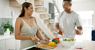 Buy stock photo Couple, kitchen and happy with cutting vegetables for salad at home for meal, lunch or nutrition. Apartment, people and laughing for joke in relationship with food for support, love or bonding