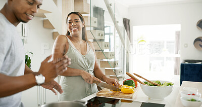 Buy stock photo African couple, happy and cooking in kitchen for dinner, bonding and relationship together with vegetables. People, smile and meal prep in home for love, support and brunch with food, diet and salad