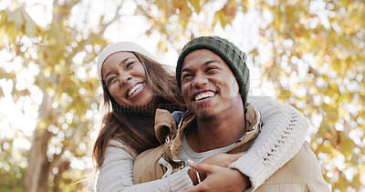 Buy stock photo Park, couple and laugh on piggyback for bonding, love or support as lovers for trust. People, outdoor and smile in relationship in autumn for romance, care and fun or games together on valentines day